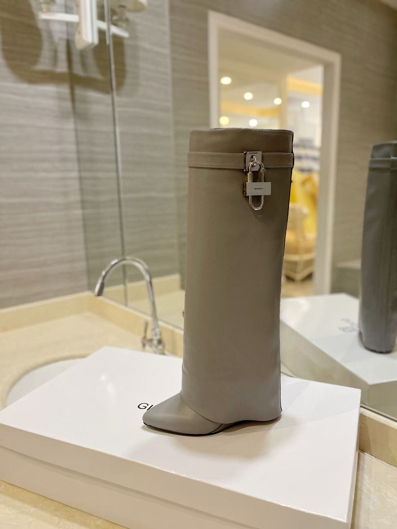 UA Givenchy Shark Lock boots in leather