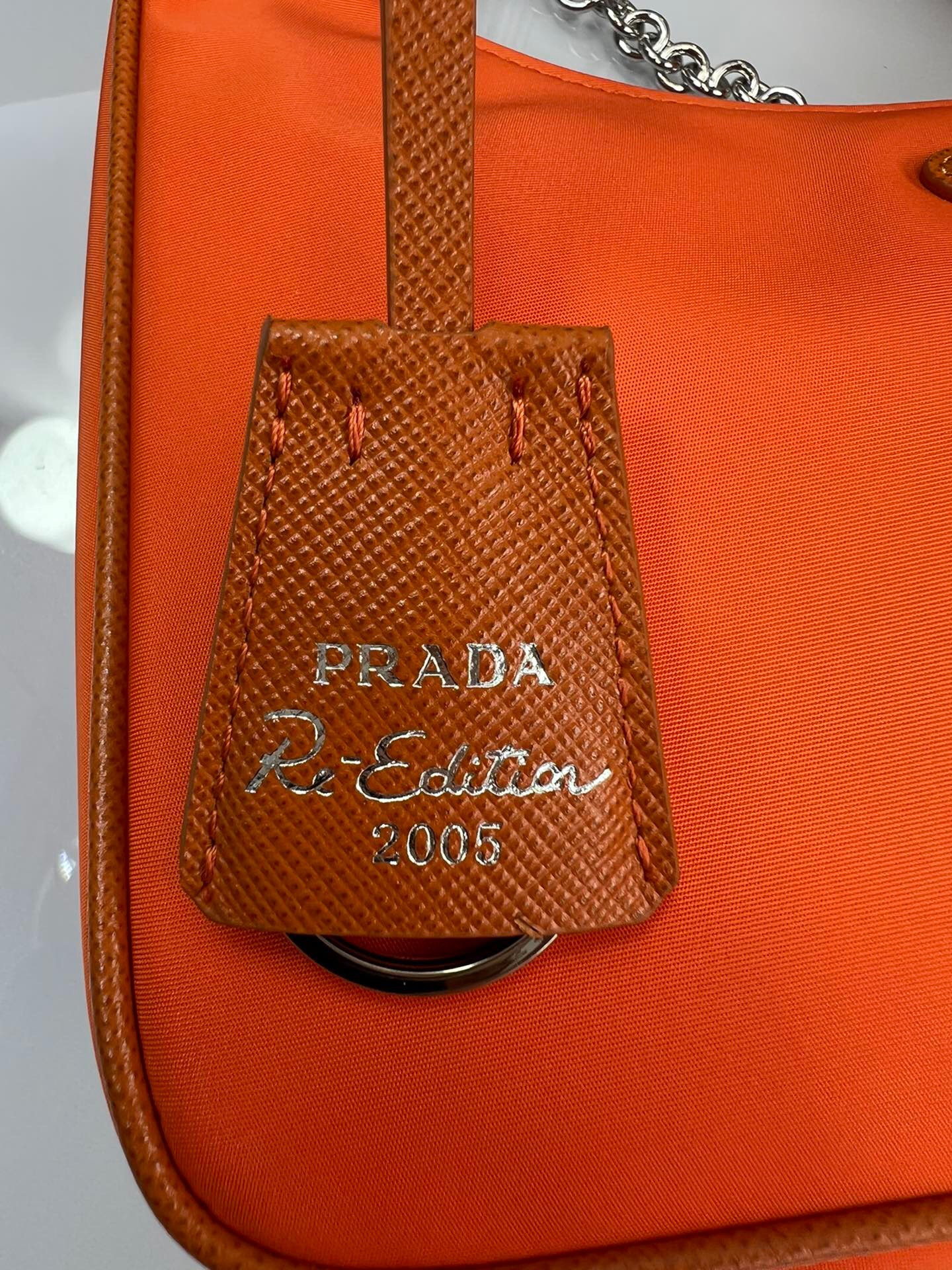 Pra*a re-edition 2005 re-nylon bag orange