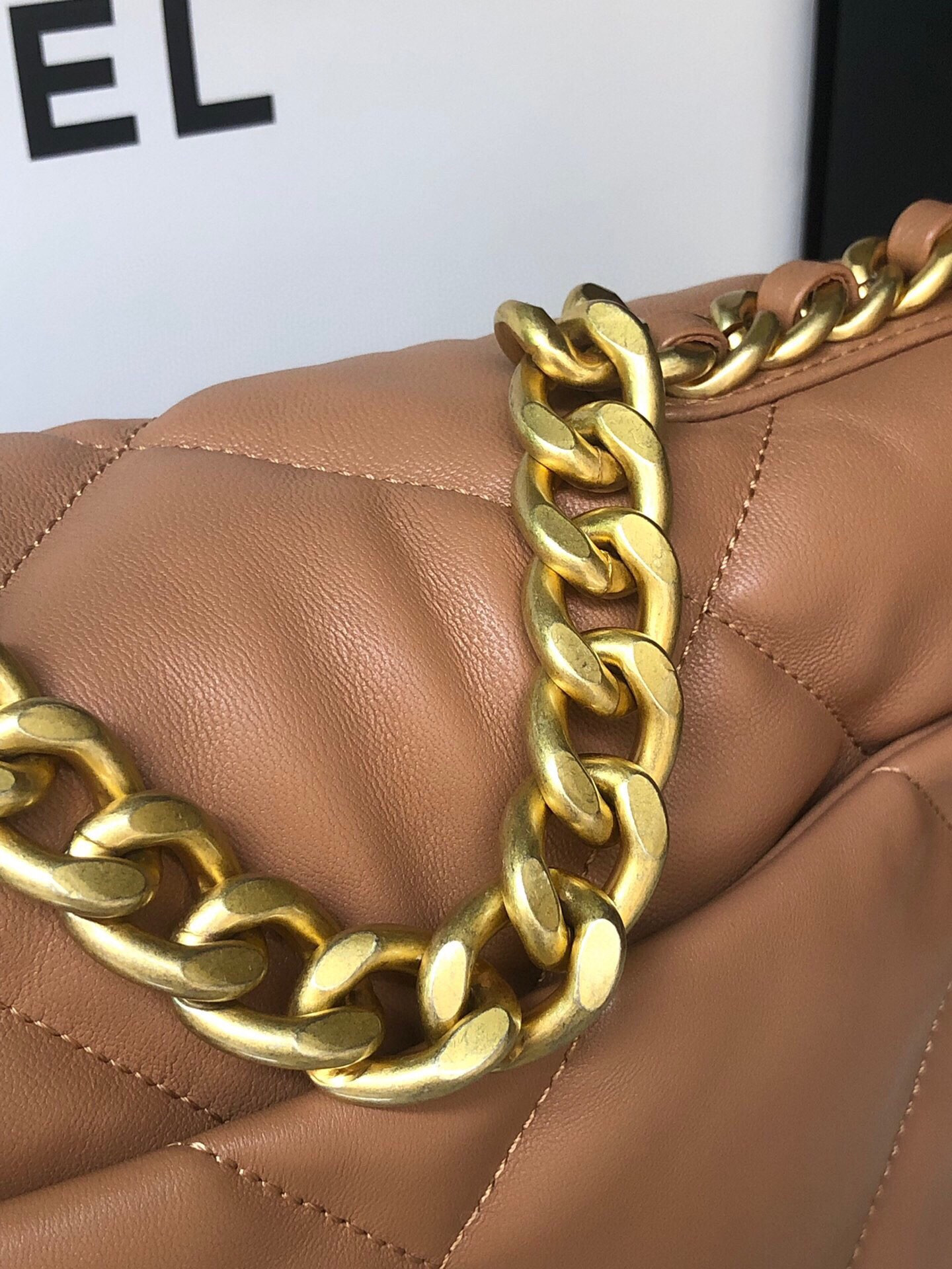 Ch*el 19 handbag shiny leather, gold-tone, silver-tone & ruthenium-finish metal caramel 6.2 × 10.1 × 3.5 in