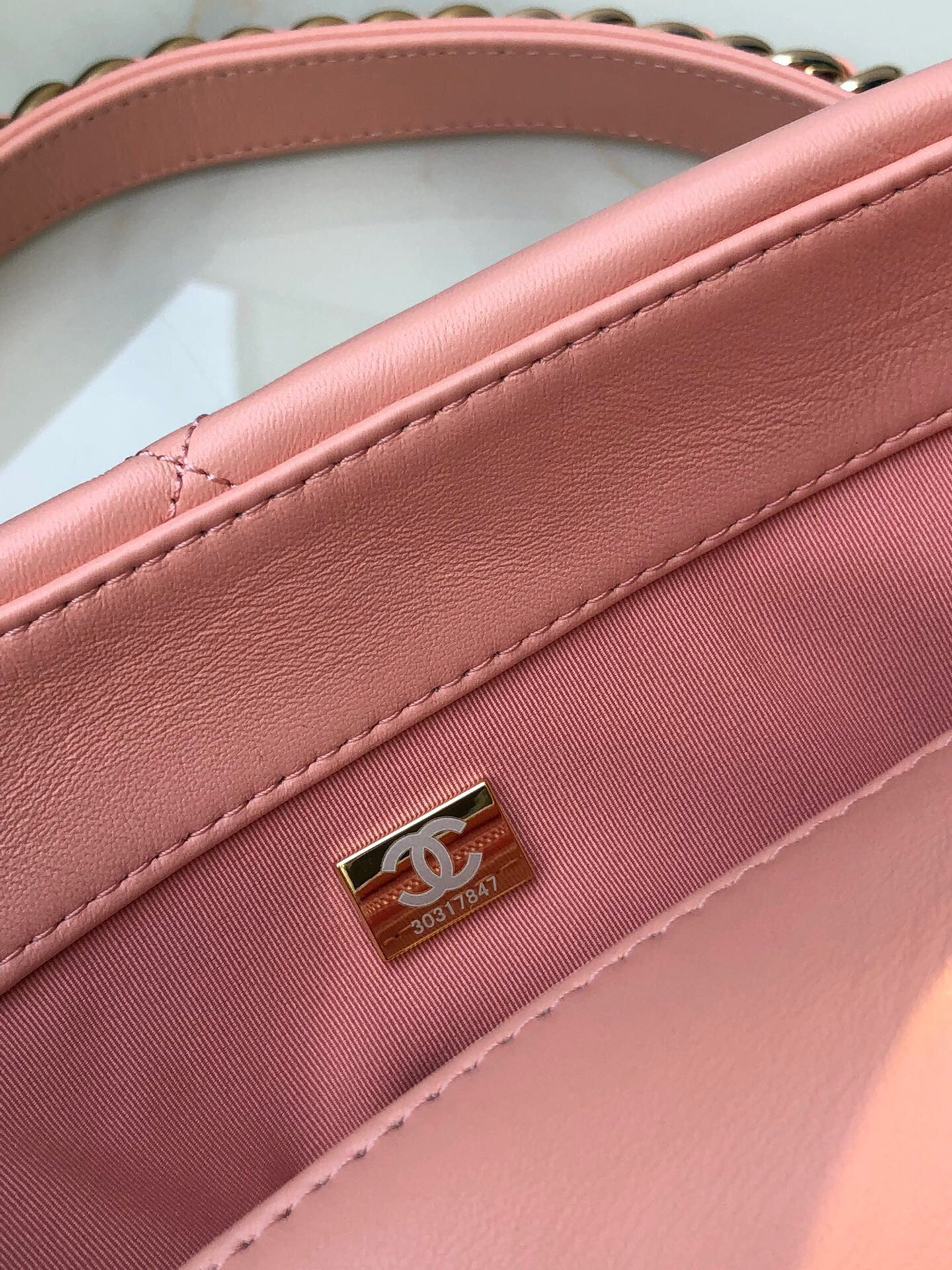 Ch*el 19 large handbag shiny leather, gold-tone, silver-tone & ruthenium-finish metal light pink 7.8 × 11.7 × 3.9 in