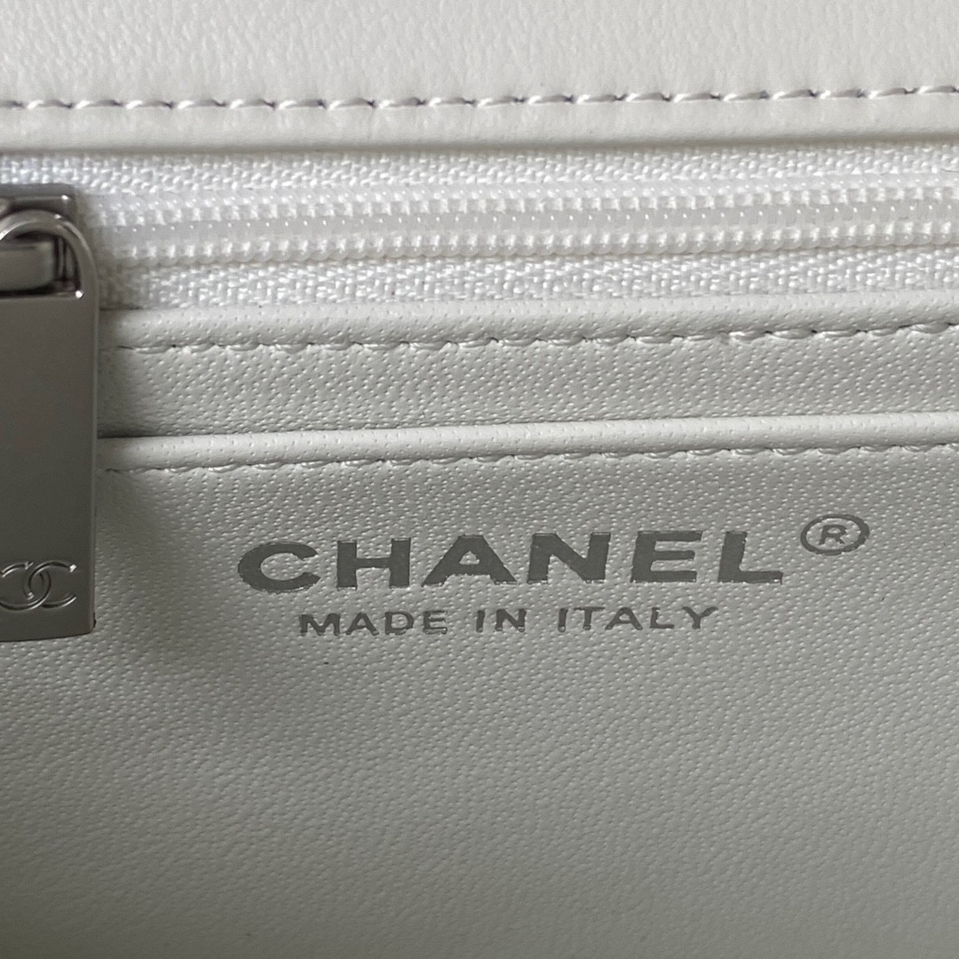 Ch*el mini flap bag shiny calfskin & silver-tone metal white 4.7 × 7.8 × 2.3 in
