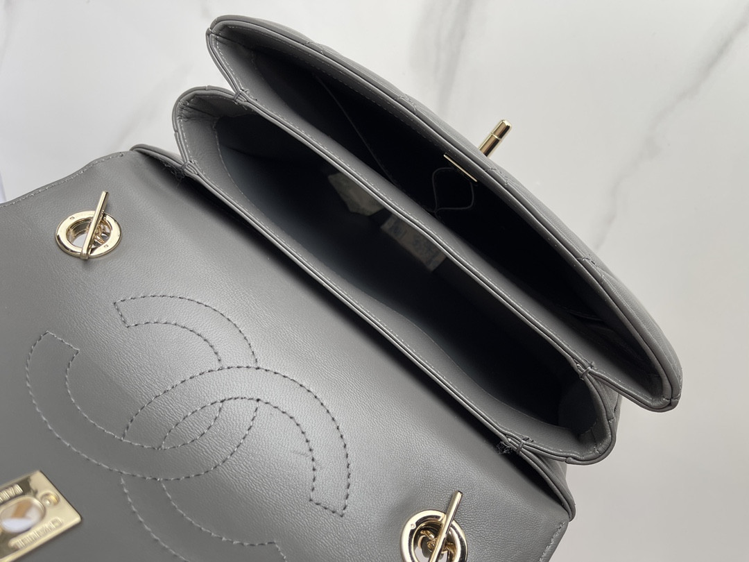 Ch*el flap bag with top handle 6.6 × 9.8 × 4.7 in