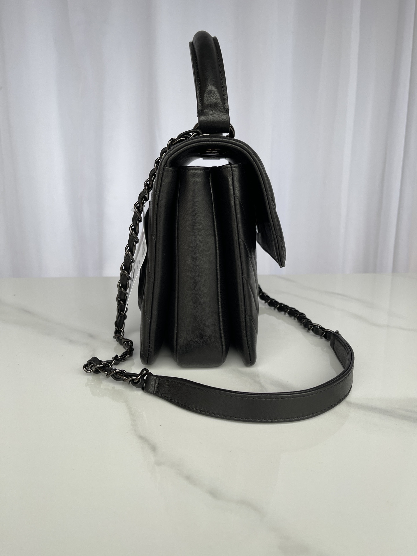 Ch*el flap bag with top handle 6.6 × 9.8 × 4.7 in