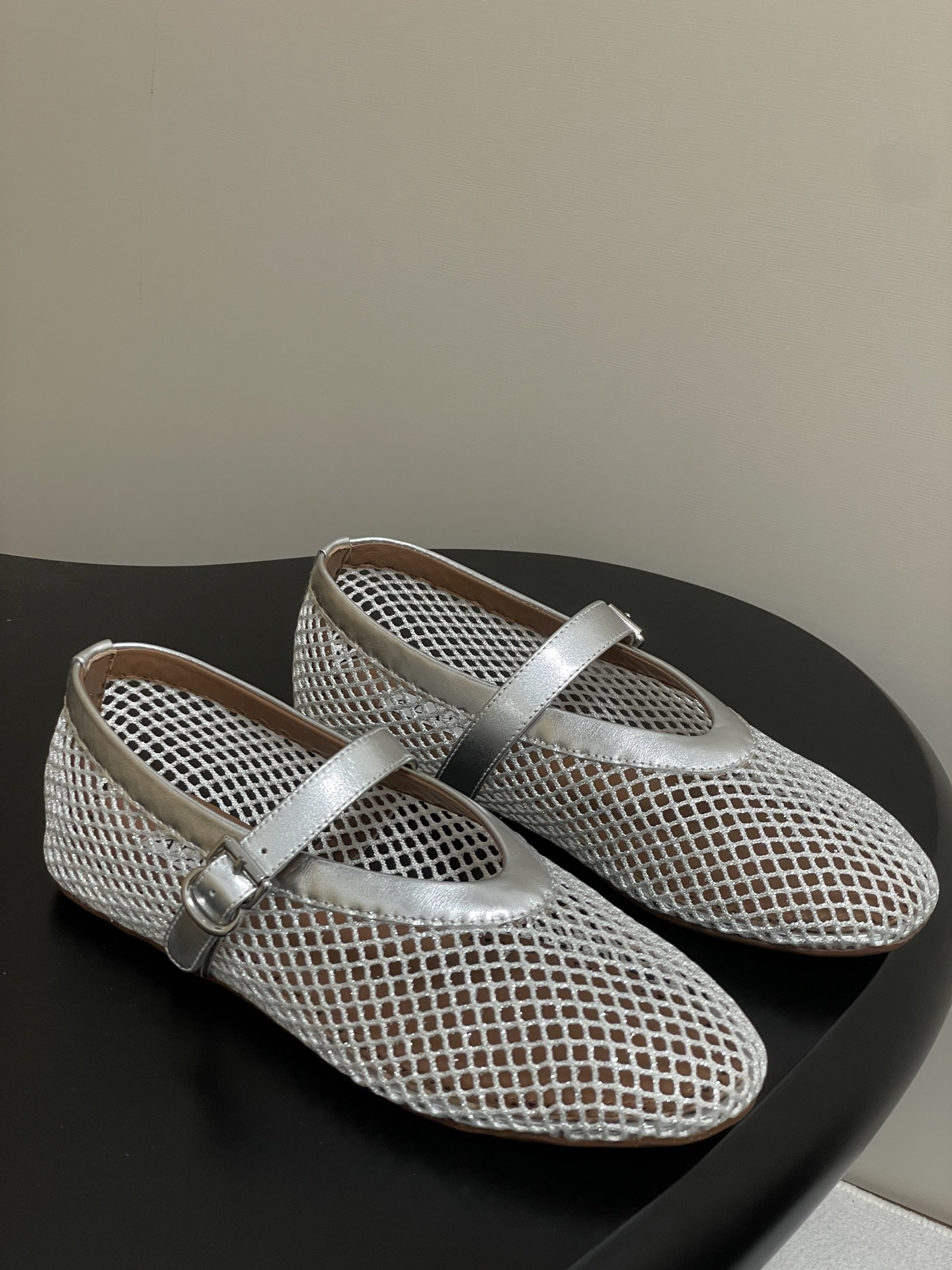 UA ALAÏA BALLET FLATS IN FISHNET