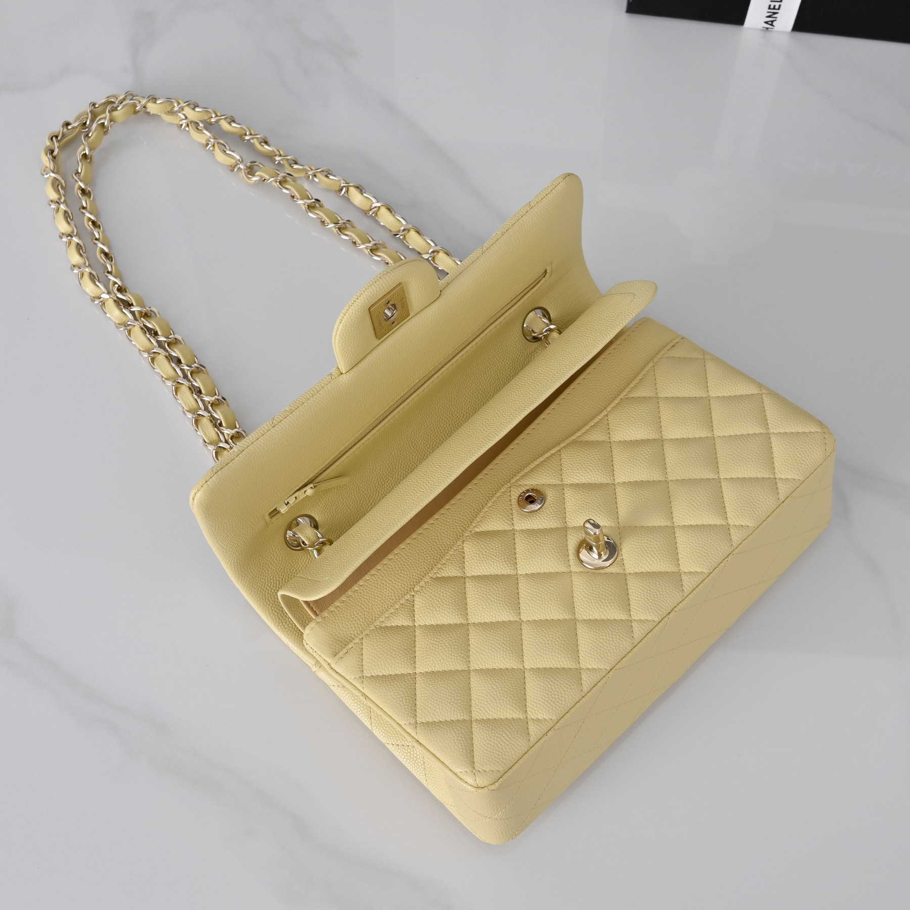 Chanel Classic Flap handbag Baby yellow with light gold hardware and caviar leather A01113 23x14.5x6cm