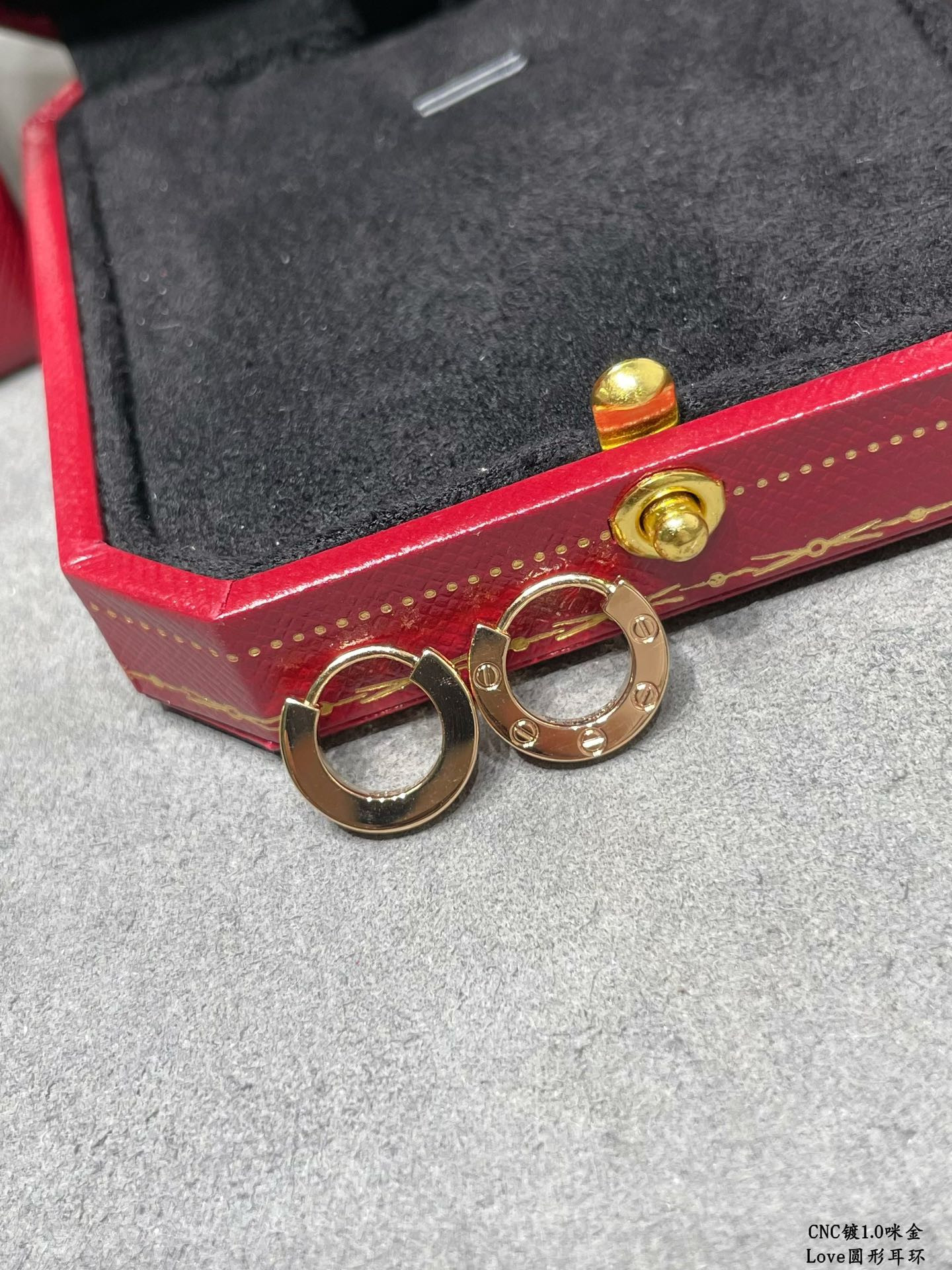 Ca*t1er LOVE glossy round earrings