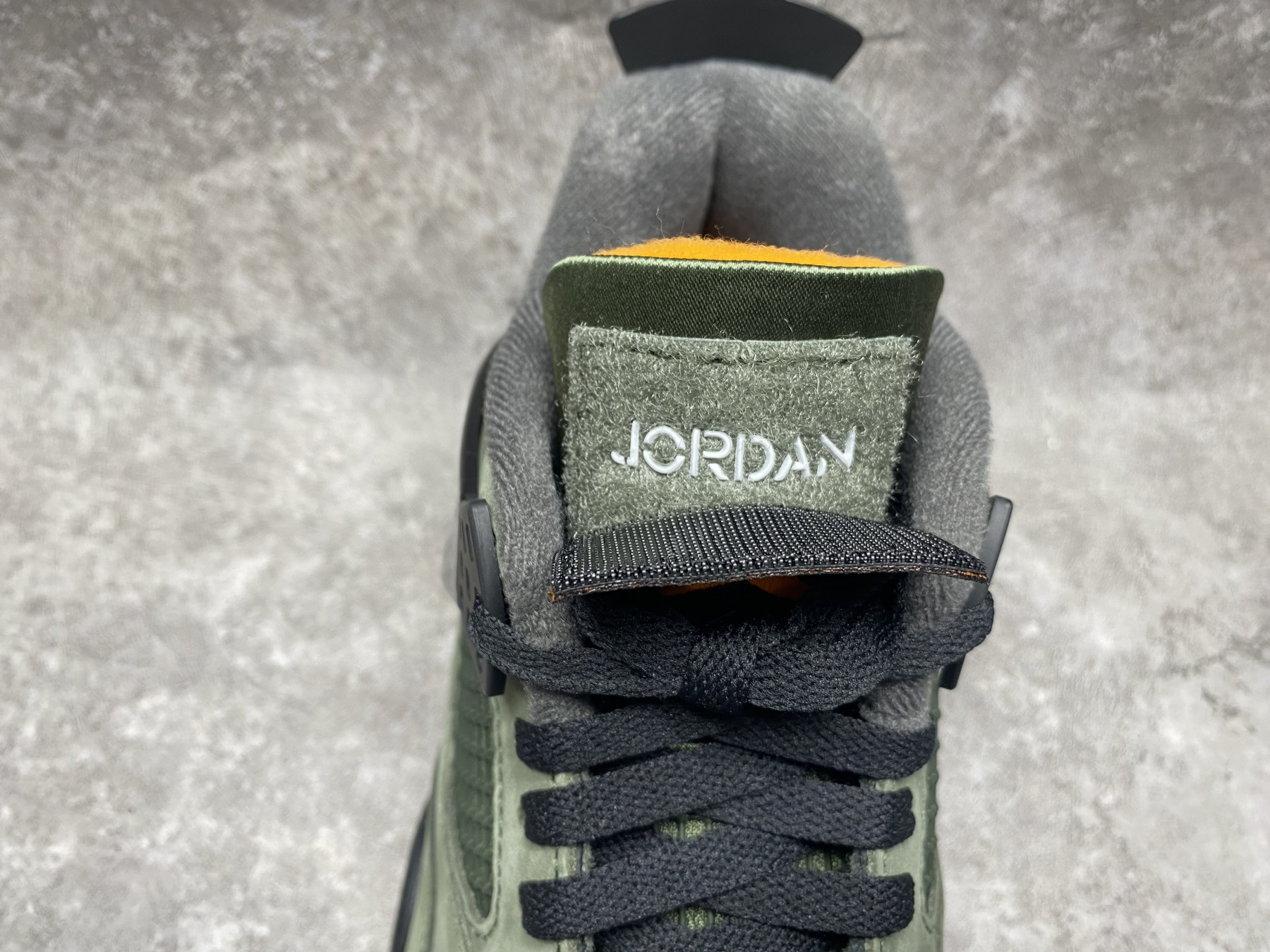 UA Jordan 4 Retro