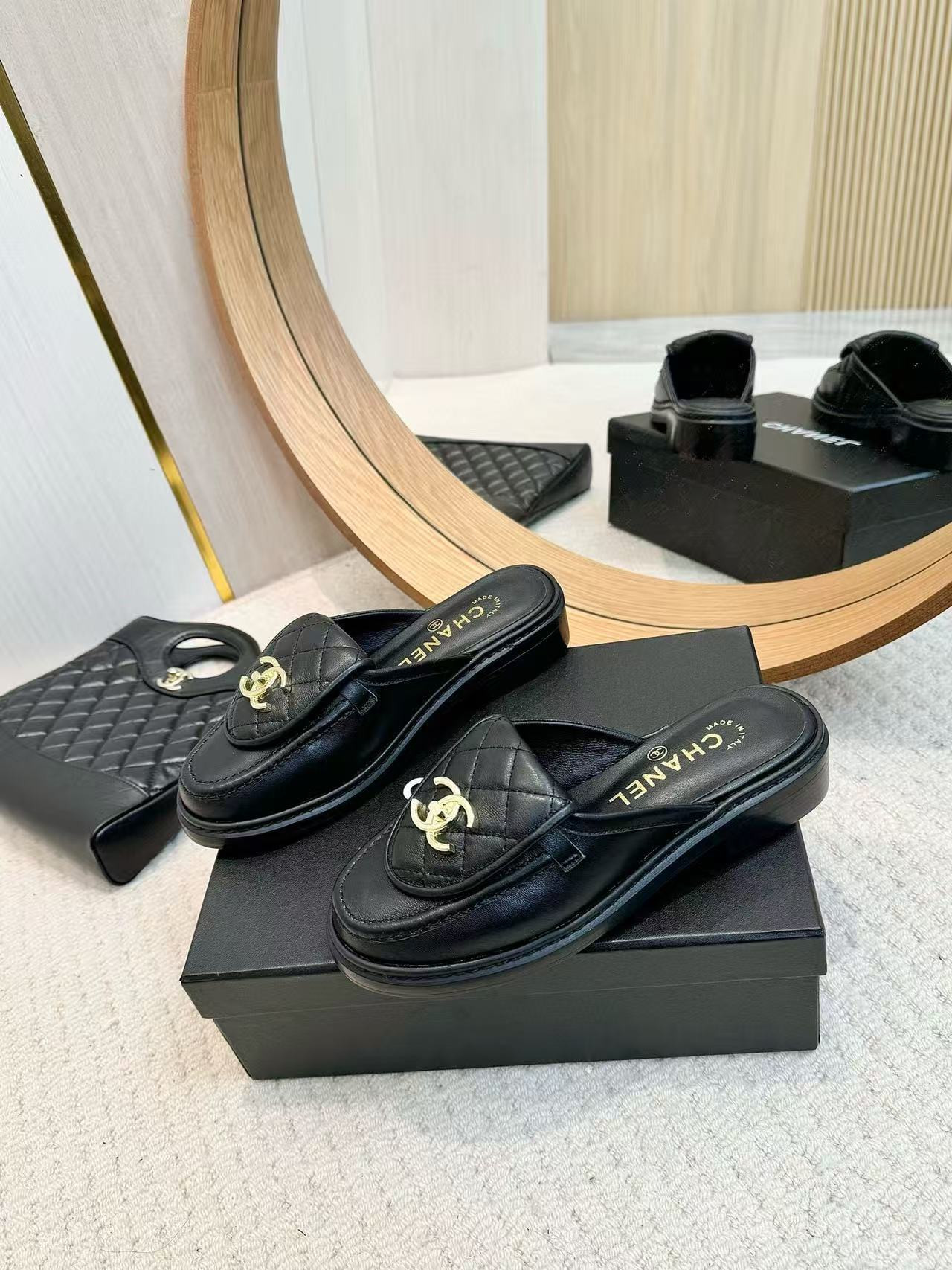 UA Ch**el Slides Leather Flats