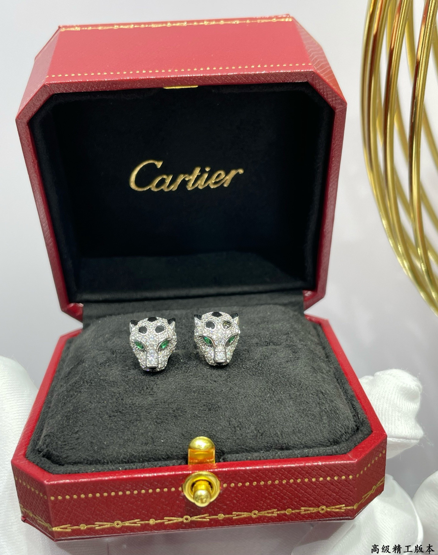 Ca*t1er earrings