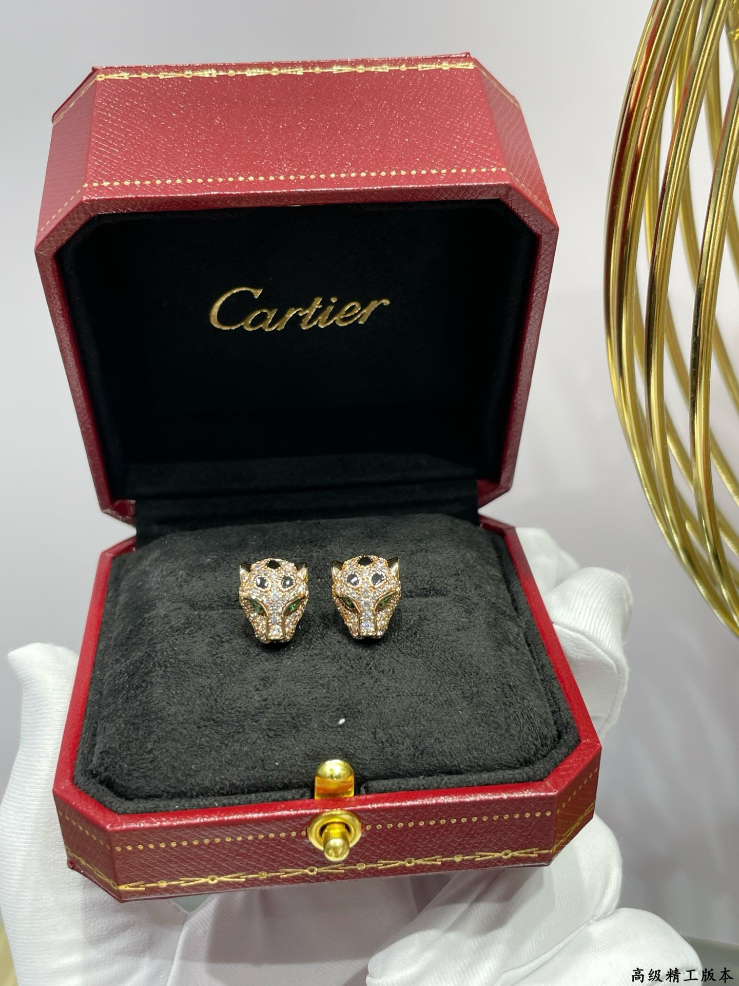 Ca*t1er earrings
