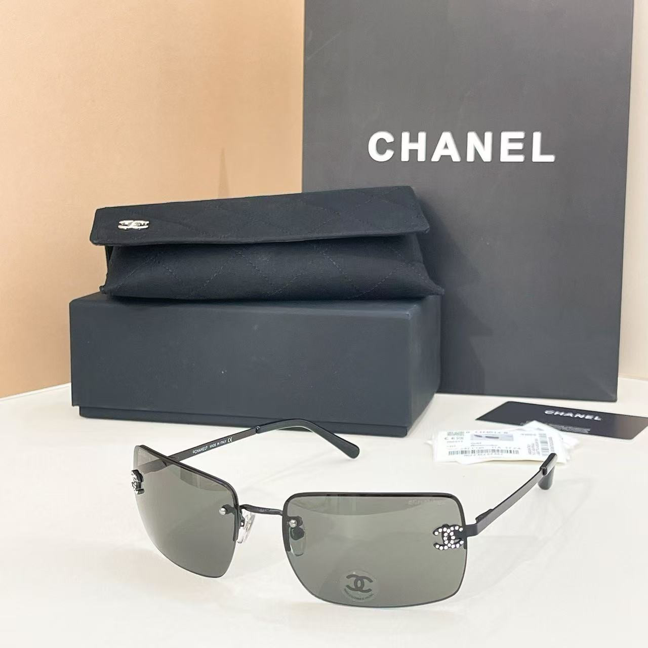 Ch**el crystal logo glasses