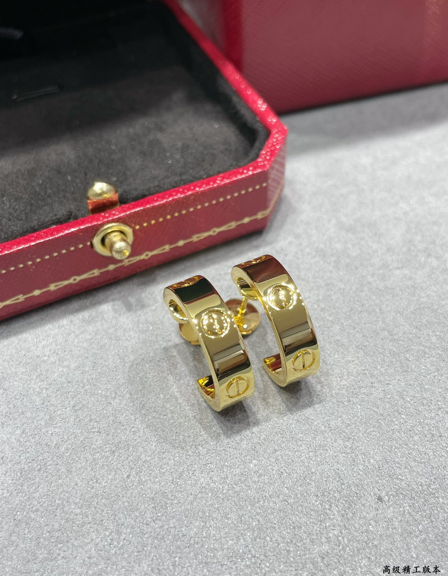 Ca*t1er Wide glossy LOVE Earrings