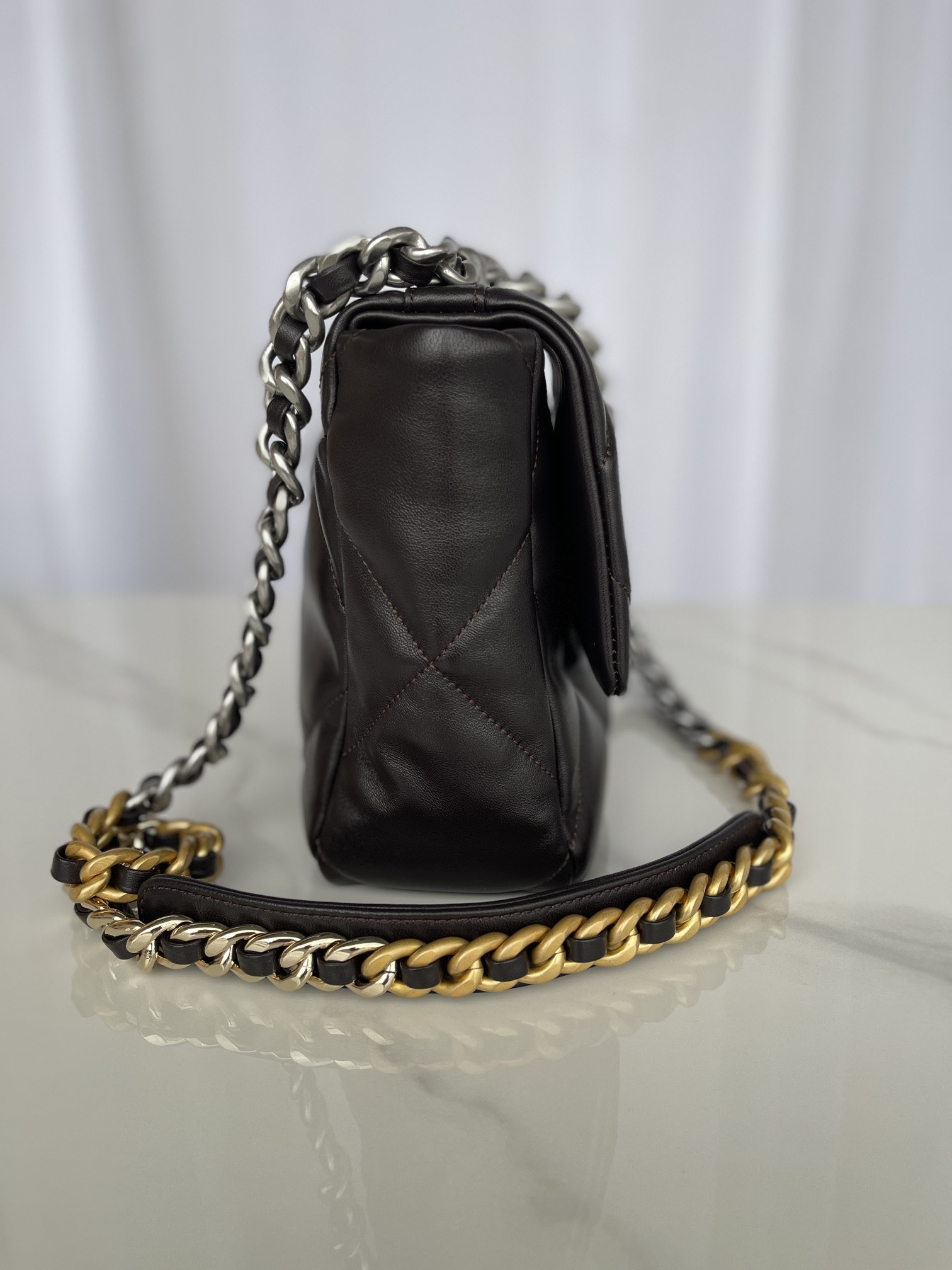 Ch**el 19 LARGE HANDBAG Shiny Leather Black, Gold-Tone, Silver-Tone & Ruthenium-Finish Metal 7.8 × 11.7 × 3.9 in