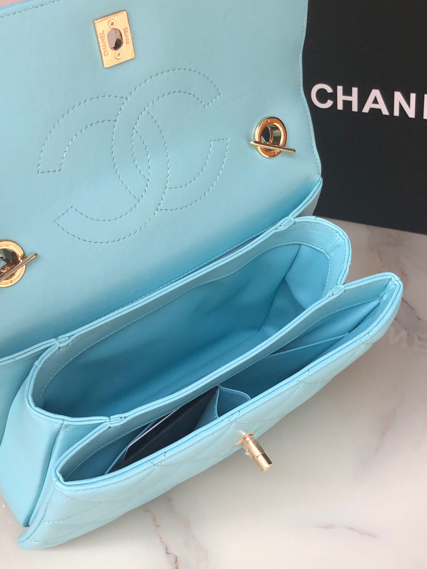 Ch**el FLAP BAG WITH TOP HANDLE 6.6 × 9.8 × 4.7 in