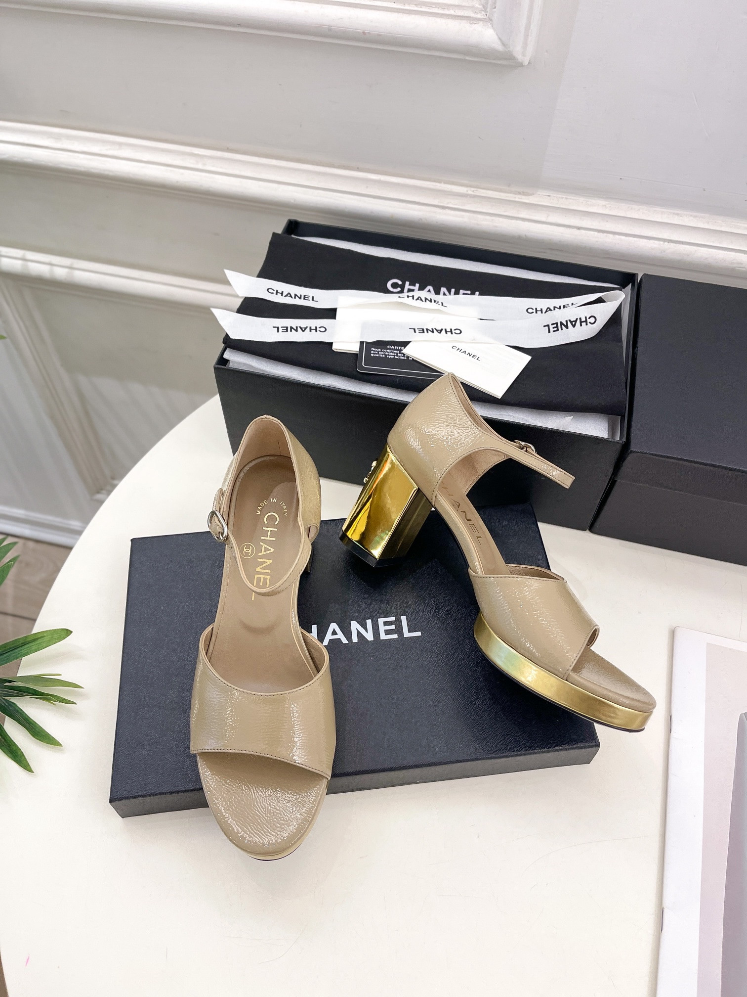 UA Ch**el HEELED SANDALS
